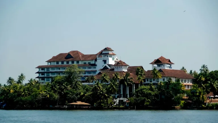 Ashtamudi Lake in Kollam Kerala with scenic backwaters and waterfront resort view